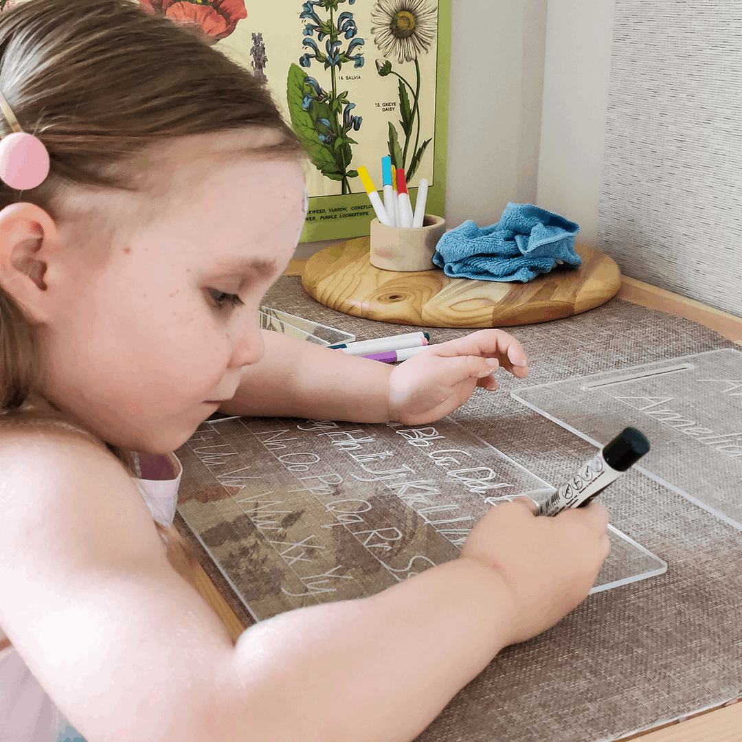 Child using Alphabet Tracing Board