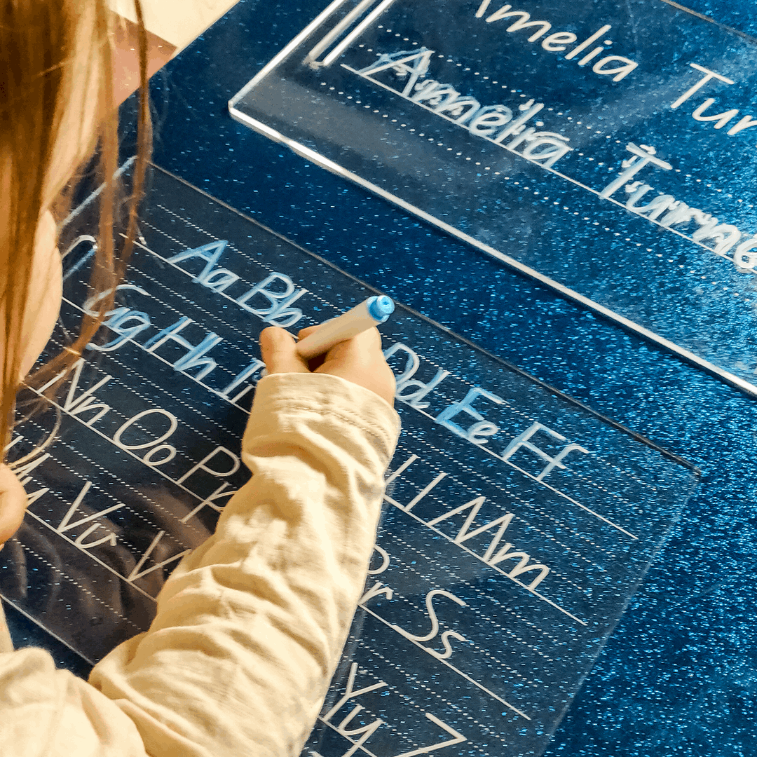 Child using Alphabet Tracing Board