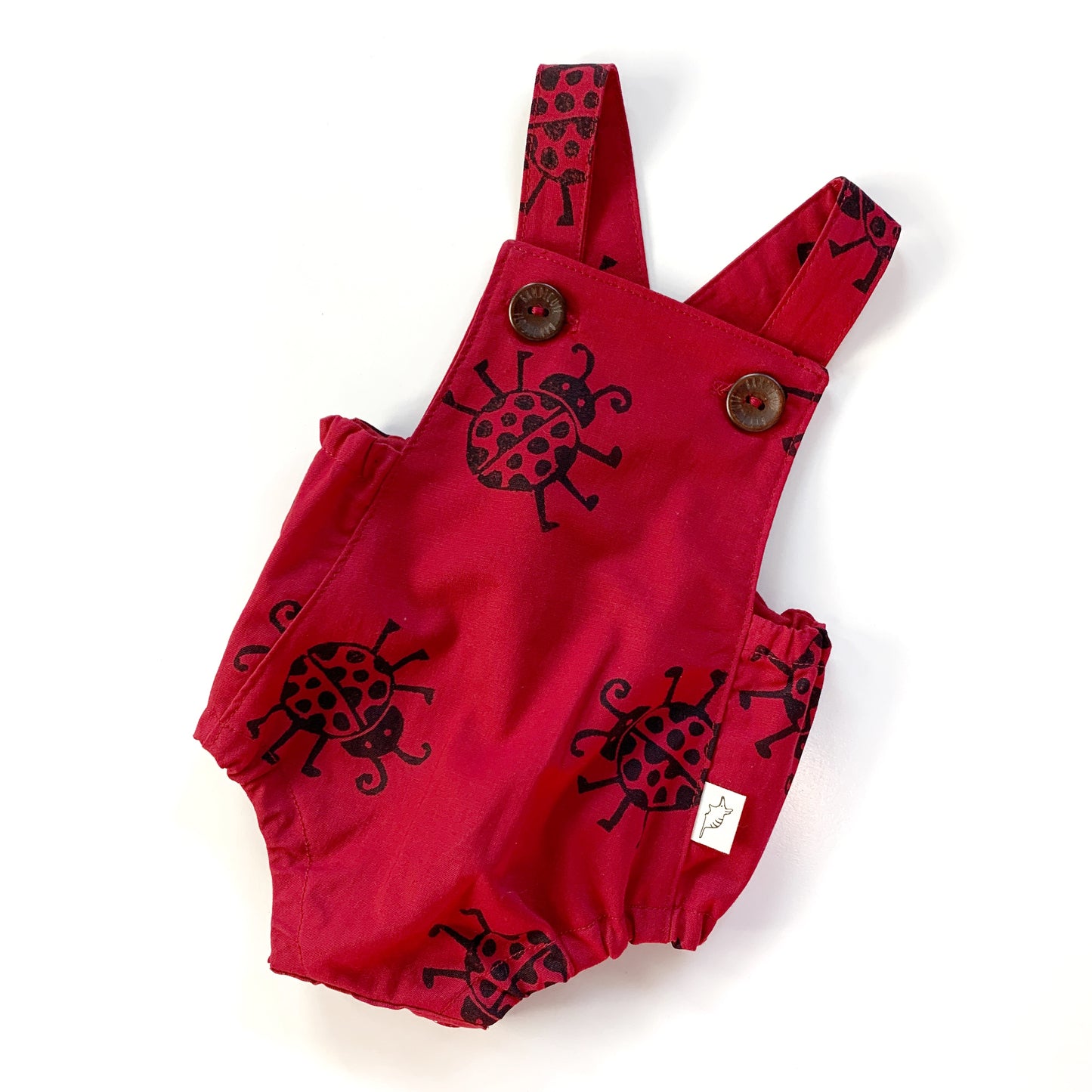 Flat Lay Ladybug Romper